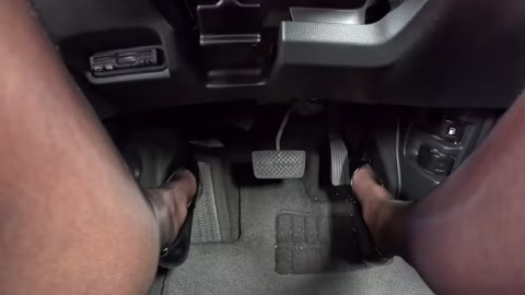 I Press The Pedal In Stockings And Patent Leather High Heels